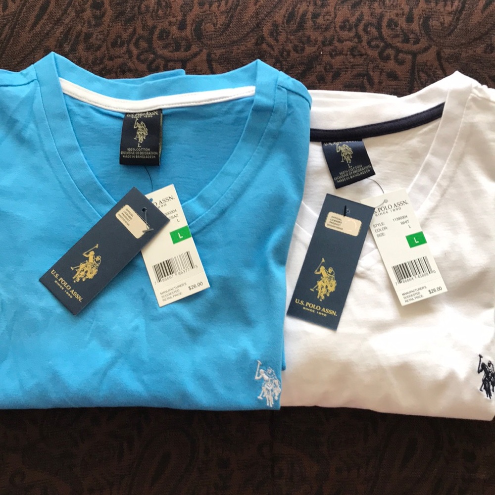 U.S. POLO ASSN. in large both have tags on still.